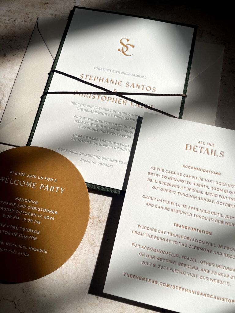 Modern and elegant book bound letterpress and foil printed wedding invitation suite. 