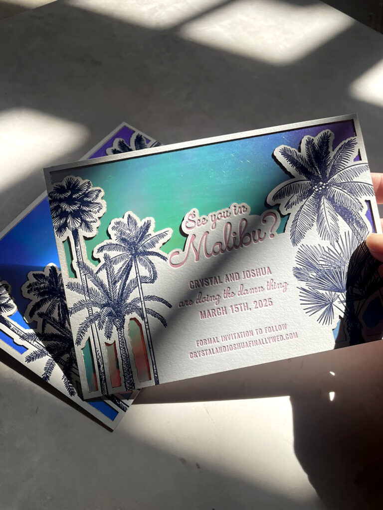 holographic sunset die-cut palm trees for a Malibu save the date card by Bodega Press