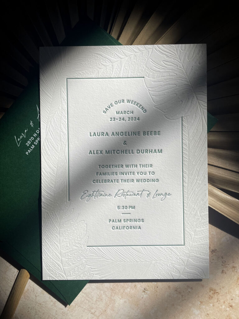 Palm leaves deboss impression invitation for a wedding in Palm Springs by Bodega Press