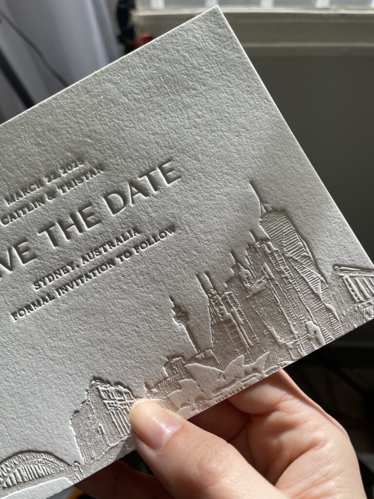 Deboss Sydney city skyline invitation by Bodega Press